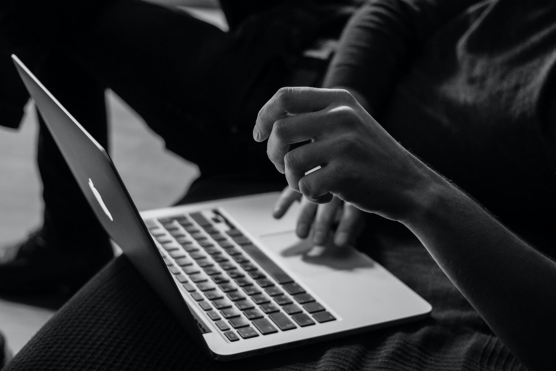 person using their laptop
